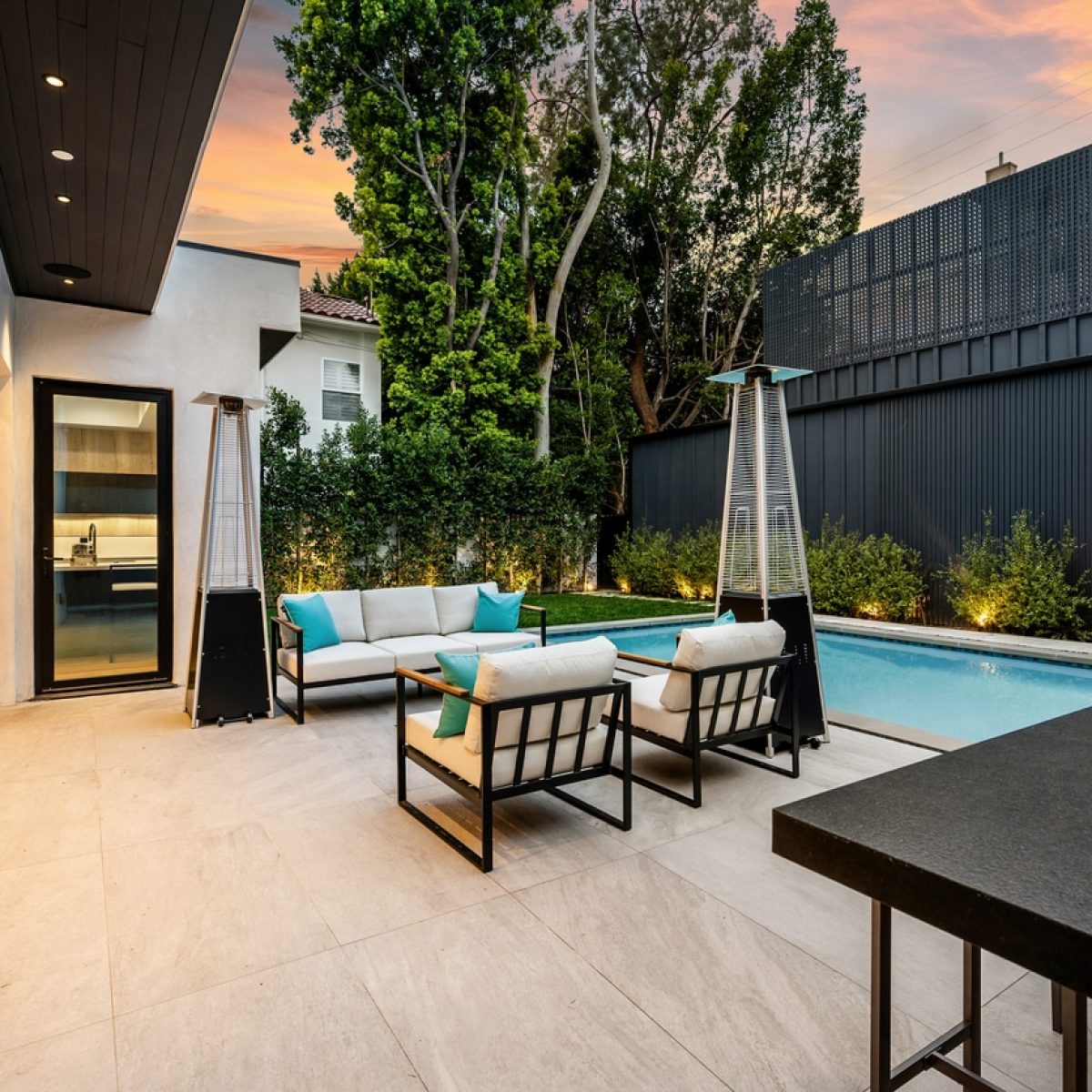 City home patio illuminated by exterior lights